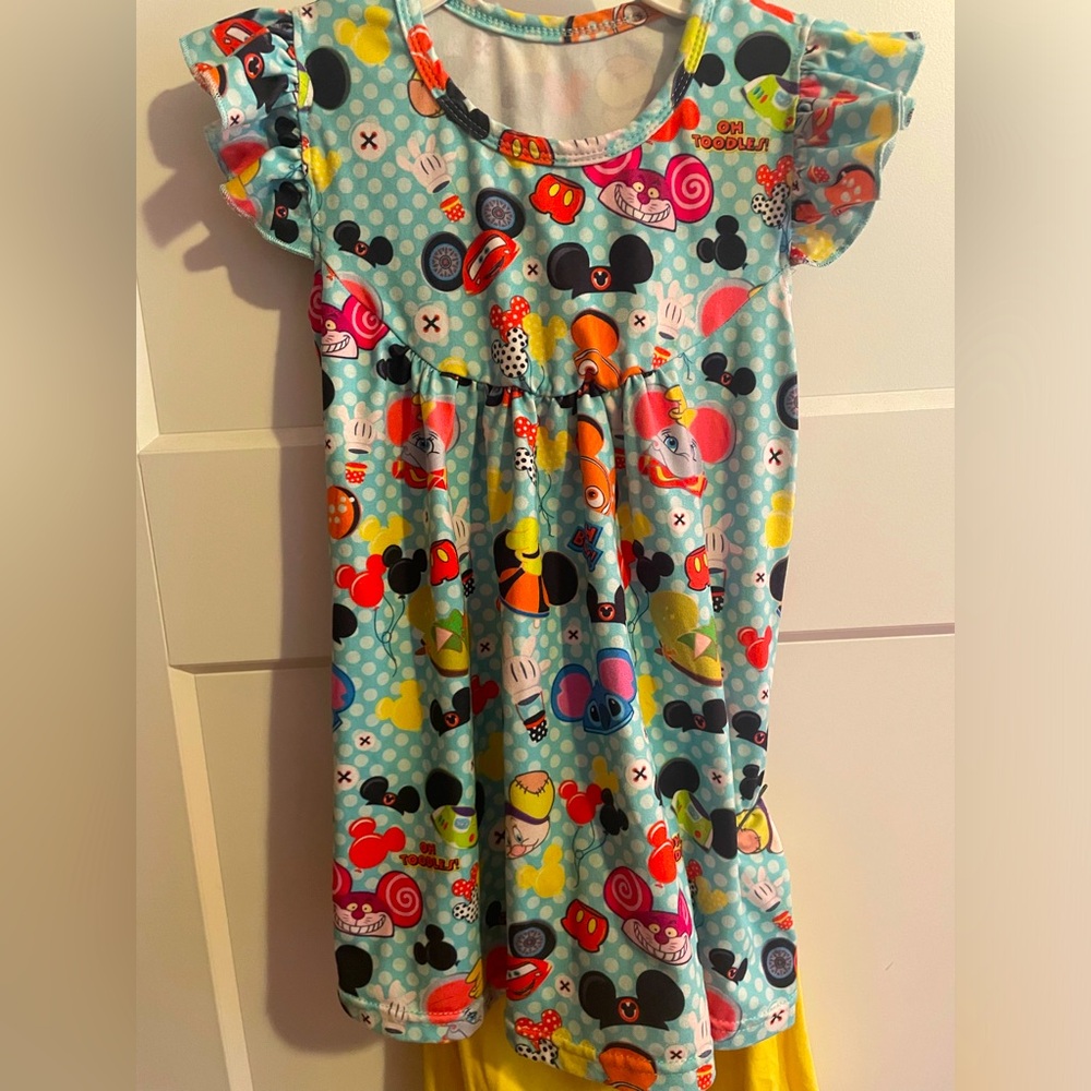 Disney dress w/ different character hats including Stitch, Buzz, Cars, Nemo etc